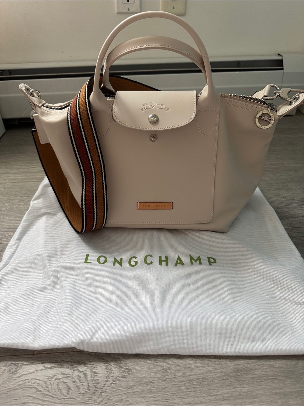 Brand new authentic Longchamp creamy white Le Pliage 100% leather